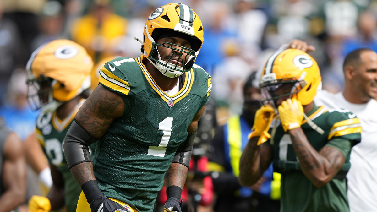 Green Bay Packers defensive end Micah Parsons (1) warms up before the game against the Detroit Lions at Lambeau Field.