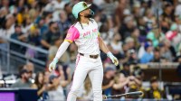 San Diego Padres right fielder Fernando Tatis Jr. (23) hits a grand slam home run during the fourth inning Arizona Diamondbacks at Petco Park.