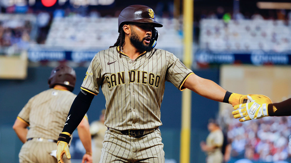 San Diego Padres right fielder Fernando Tatis Jr. (23) celebrates his run against the Minnesota Twins in the seventh inning at Target Field.
