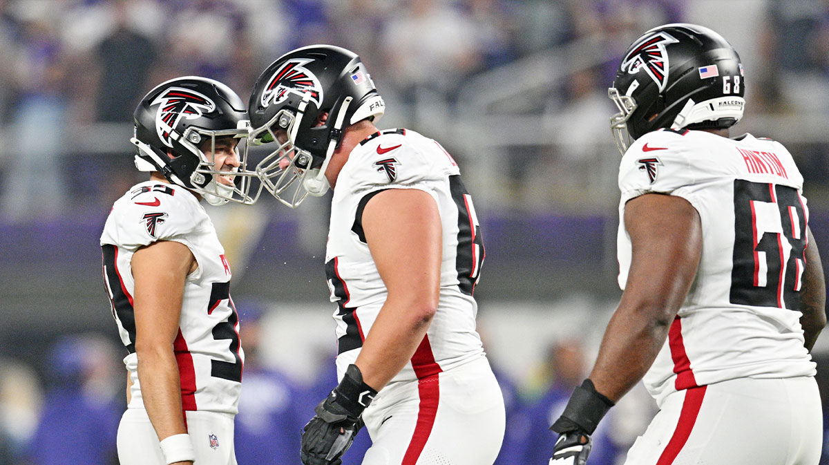 Atlanta Falcons cornerback C.J. Henderson (30) and Atlanta Falcons guard Chris Lindstrom (63) react after a play against the Minnesota Vikings during the first half at U.S. Bank Stadium. Mandatory Credit: