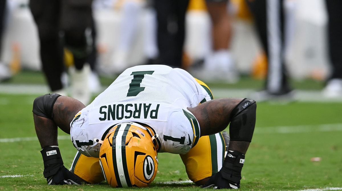Green Bay Packers defensive end Micah Parsons (1) reacts after a play against the Cleveland Browns during the second half at Huntington Bank Field.