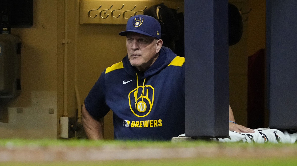 Milwaukee Brewers manager Pat Murphy looks out from the dug out against the Arizona Diamondbacks in the seventh inning