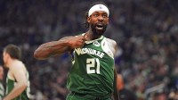 Patrick Beverley (21) gestures towards the crowd following a play during the second quarter against the Indiana Pacers during game five of the first round for the 2024 NBA playoffs at Fiserv Forum