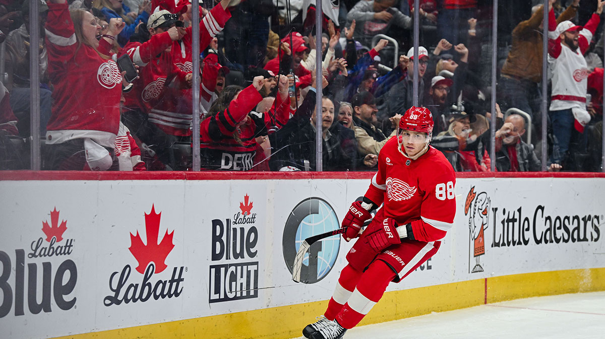 Detroit Red Wings right wing Patrick Kane (88) as fans celebrate his goal during the second period against the Carolina Hurricanes at Little Caesars Arena. Mandatory Credit: Tim Fuller-Imagn Images