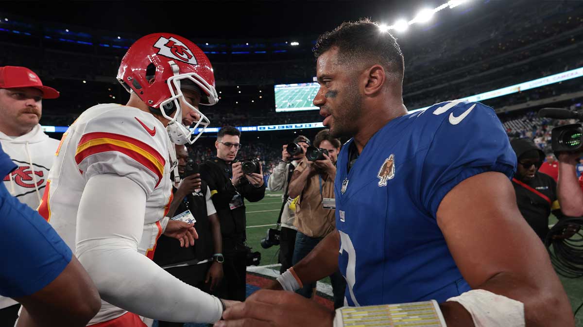 Kansas City Chiefs quarterback Patrick Mahomes (15) shakes hands with New York Giants quarterback Russell Wilson (3) after the game at MetLife Stadium.