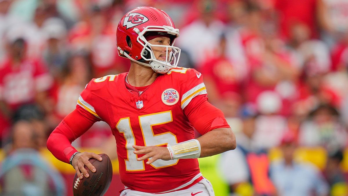 Kansas City Chiefs quarterback Patrick Mahomes (15) passes the ball against the Philadelphia Eagles during the fourth quarter of the game at GEHA Field at Arrowhead Stadium.