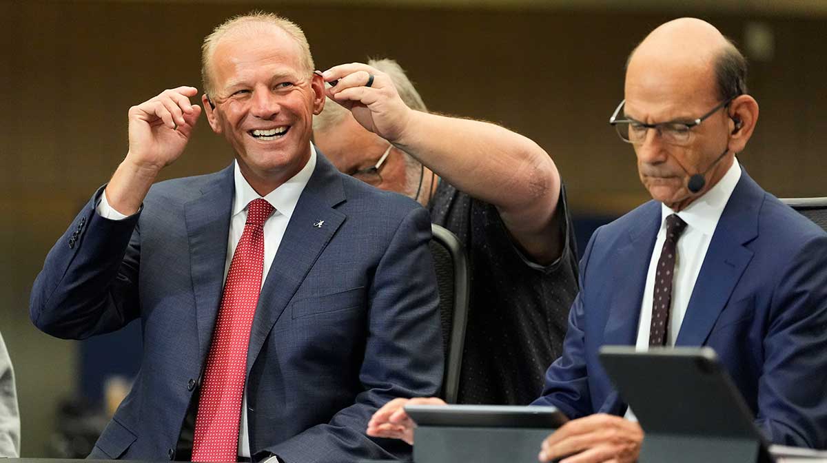 July 16, 2025; Atlanta, GA, USA; Alabama head coach Kalen DeBoer is readied for an interview with ESPN during SEC Media Days at the College Football Hall of Fame in Atlanta.