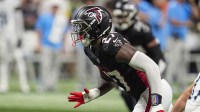 Atlanta Falcons linebacker James Pearce Jr. (27) defends against the Tennessee Titans at Mercedes-Benz Stadium.