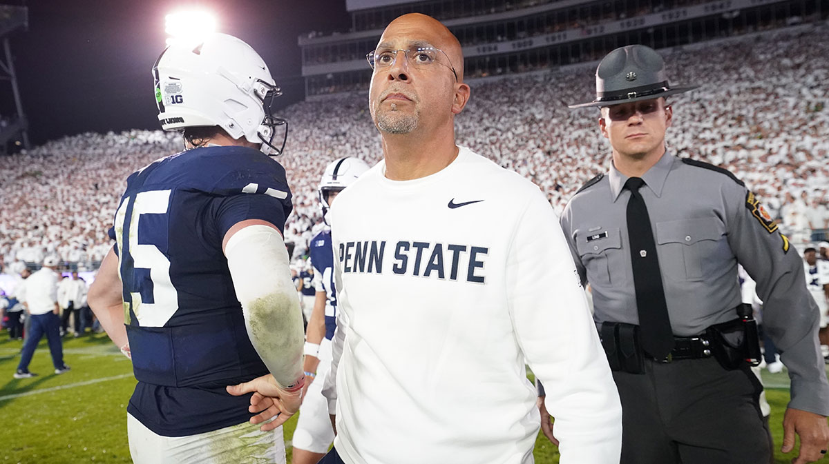 University Park, Pennsylvania, USA; Penn State Nittany Lions head coach James Franklin and quarterback Drew Allar (15) react after losing to the Oregon Ducks at Beaver Stadium