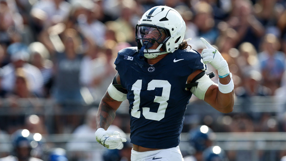 Penn State Nittany Lions linebacker Tony Rojas (13) reacts following a sack on Villanova Wildcats quarterback Tanner Maddocks (3) during the second quarter at Beaver Stadium.