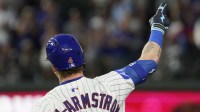 Chicago Cubs outfielder Pete Crow-Armstrong (4) gestures after hitting a home run against the Boston Red Sox during the eighth inning at Wrigley Field.