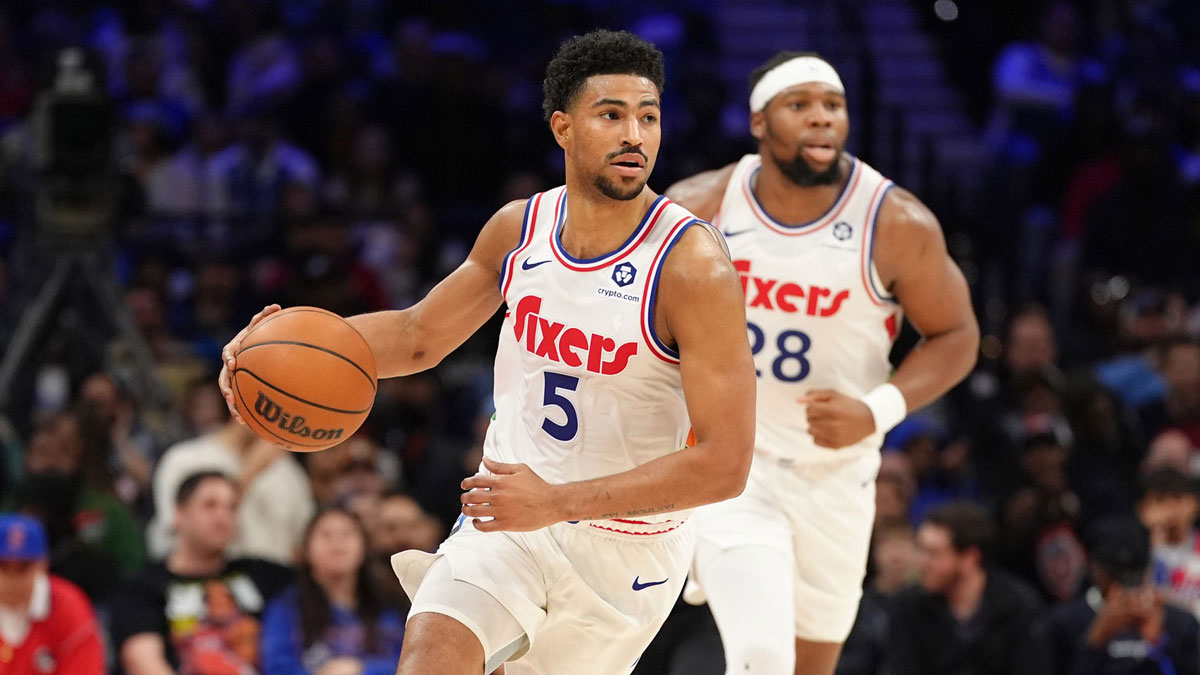 Philadelphia 76ers guard Quentin Grimes (5) controls the ball against the Milwaukee Bucks in the fourth quarter at Wells Fargo Center.