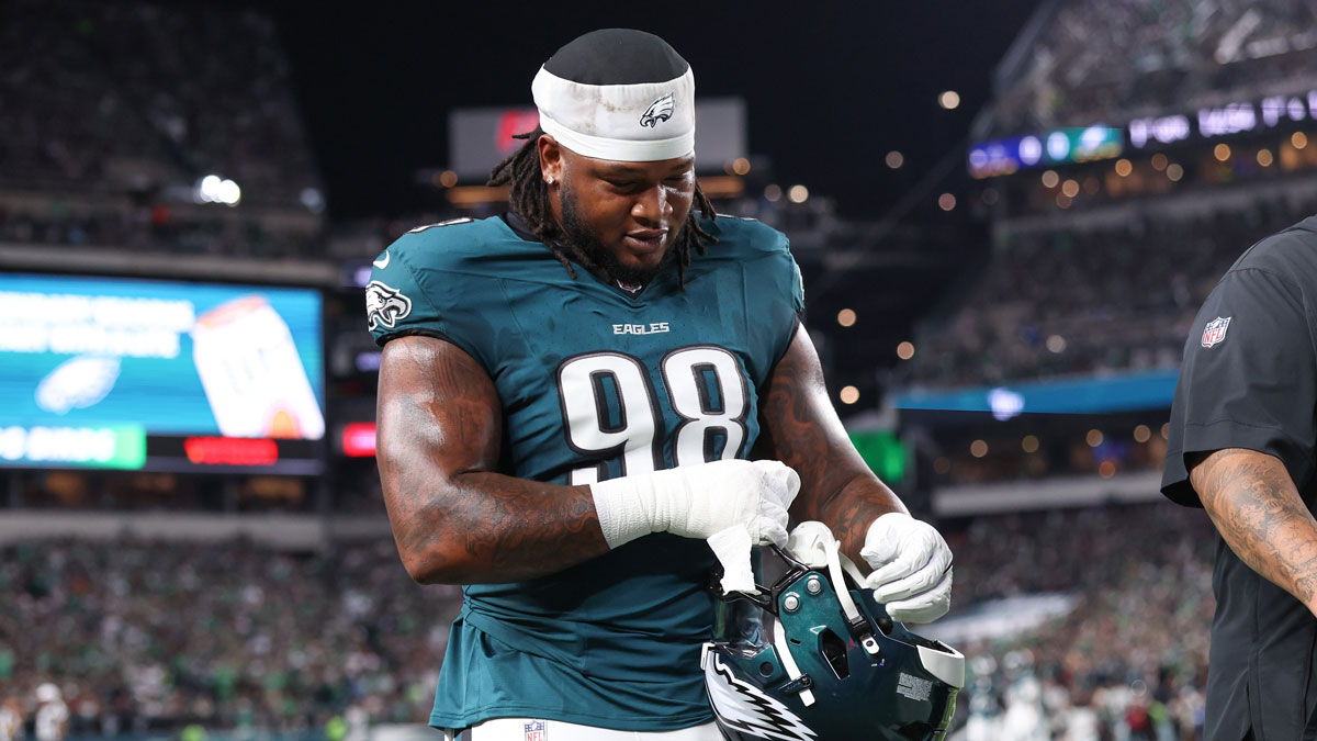 Philadelphia Eagles defensive tackle Jalen Carter (98) walks off the field after being ejected during the first quarter of the game against the Dallas Cowboys at Lincoln Financial Field.