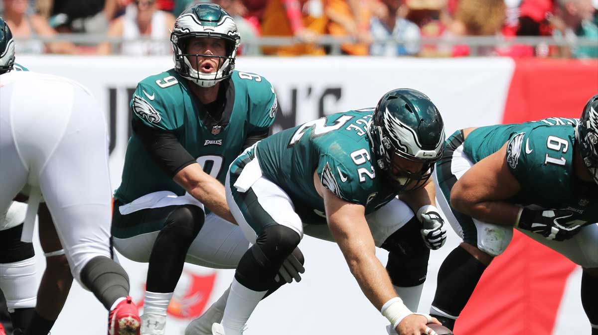 Sep 16, 2018; Tampa, FL, USA; Philadelphia Eagles quarterback Nick Foles (9) calls a play as center Jason Kelce (62) gets ready to hike the ball during the first quarter at Raymond James Stadium. Mandatory Credit: Kim Klement-Imagn Images