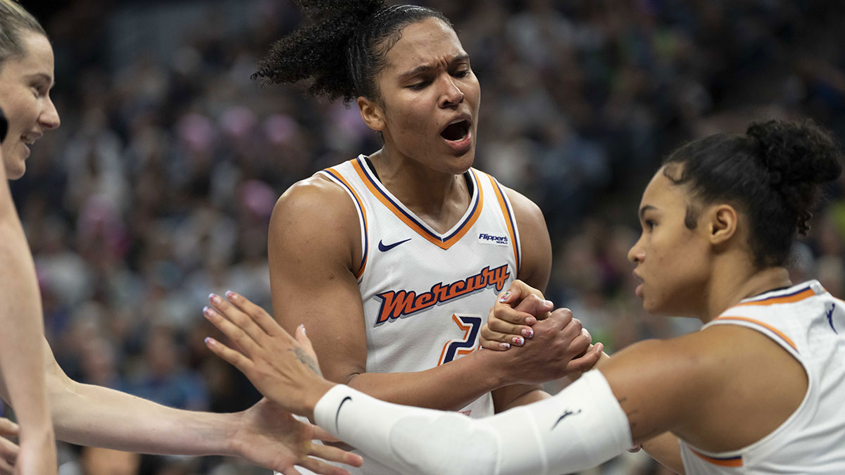 Phoenix Mercury forward Alyssa Thomas (25) celebrates with forward Satou Sabally (0) against the Minnesota Lynx in the second half during game two of the second round for the 2025 WNBA Playoffs at Target Center.