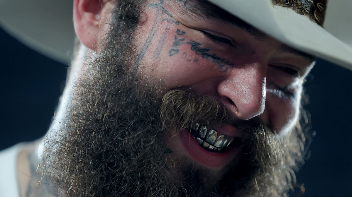 Post Malone, who met WWE legend John Cena at Clash in Paris.
