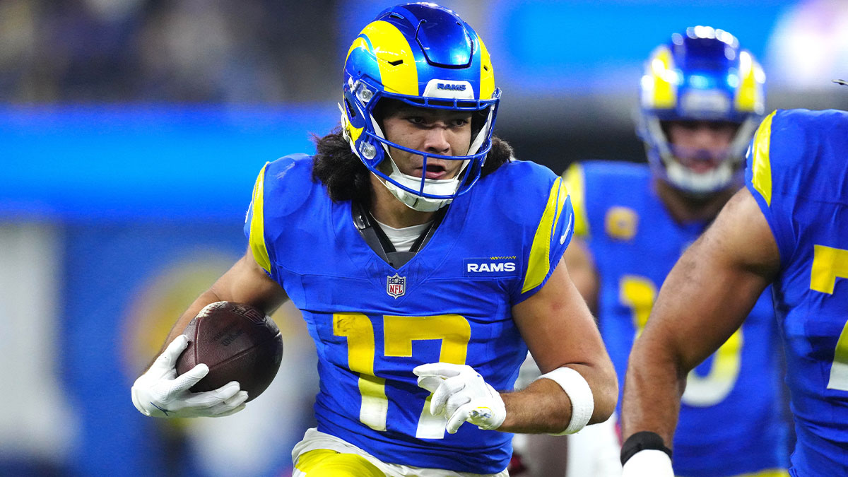 Los Angeles Rams wide receiver Puka Nacua (17) carries the ball against the Arizona Cardinals in the second half at SoFi Stadium