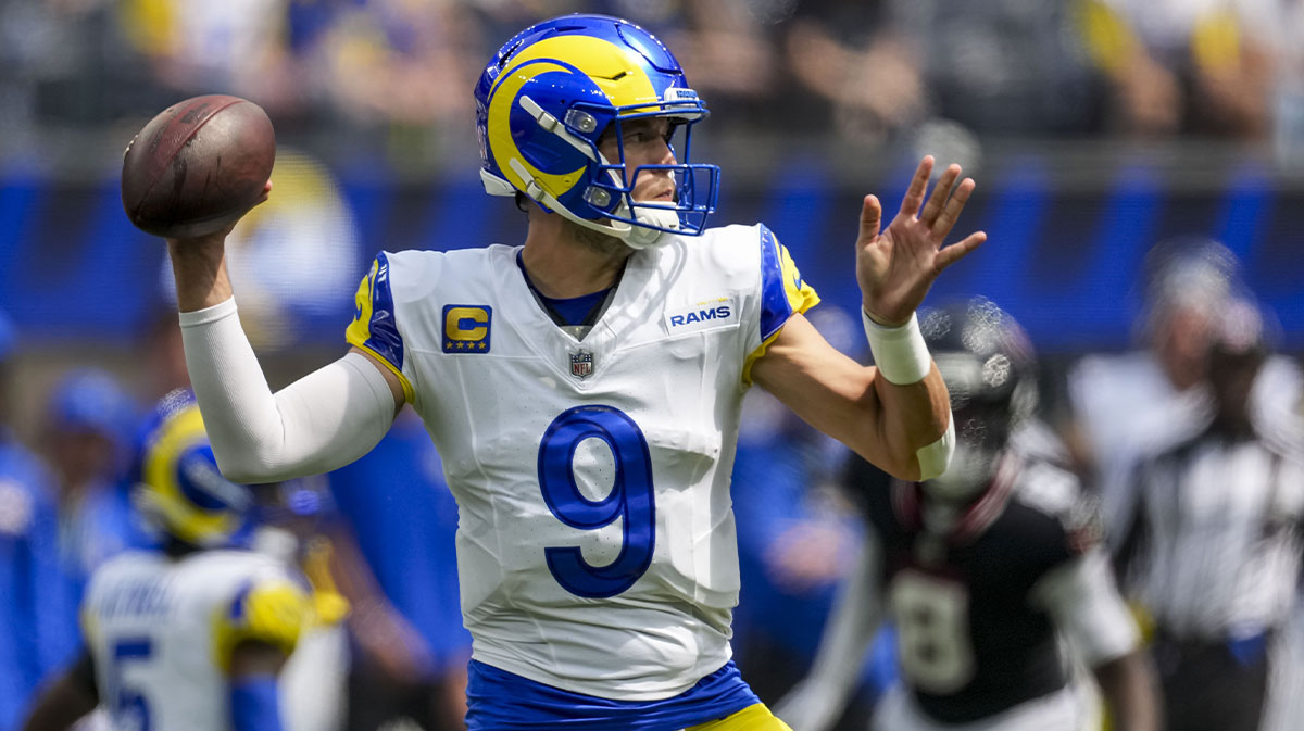 Sep 7, 2025; Inglewood, California, USA; Los Angeles Rams quarterback Matthew Stafford (9) attempts a pass during the first quarter at SoFi Stadium. Mandatory Credit: Kirby Lee-Imagn Images