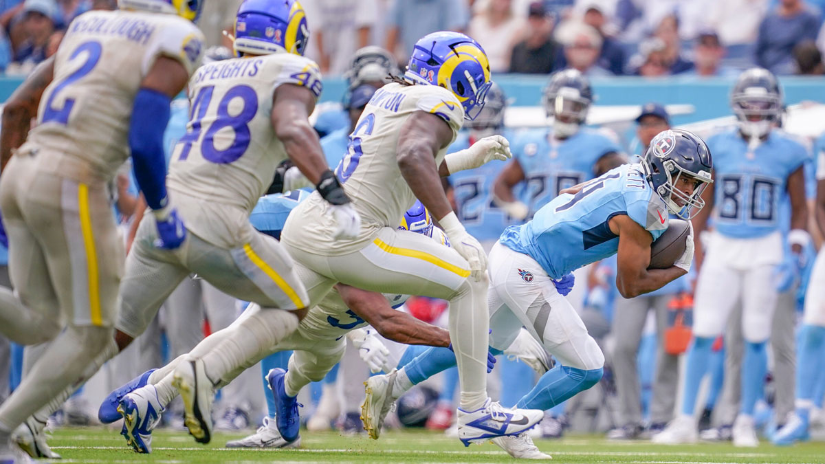 Tennessee Titans wide receiver Tyler Lockett (4) runs against the Los Angeles Rams during the third quarter at Nissan Stadium in Nashville, Tenn., Sunday, Sept. 14, 2025.