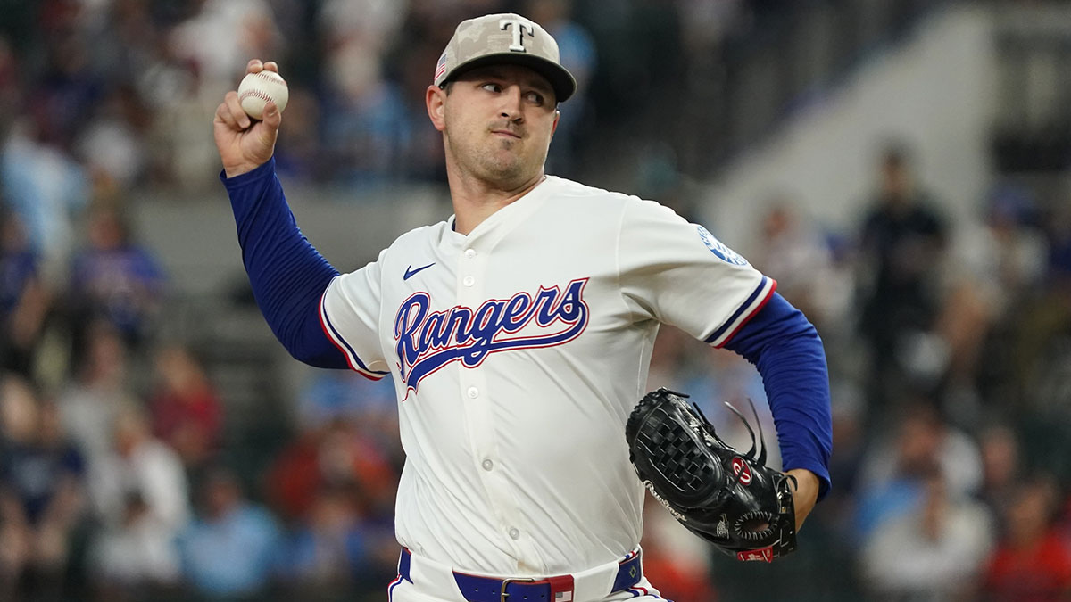 Texas Rangers pitcher Tyler Mahle (51) throws to the plate during the first inning against the Houston Astros at Globe Life Field.