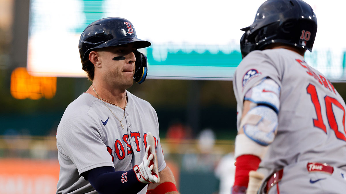 Boston Red Sox first baseman Romy Gonzalez (23) celebrates with shortstop Trevor Story (10) after hitting a solo home run during the first inning against the Athletics at Sutter Health Par