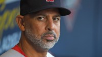 Red Sox manager Alex Cora (13) in the dugout against the Philadelphia Phillies at Citizens Bank Park