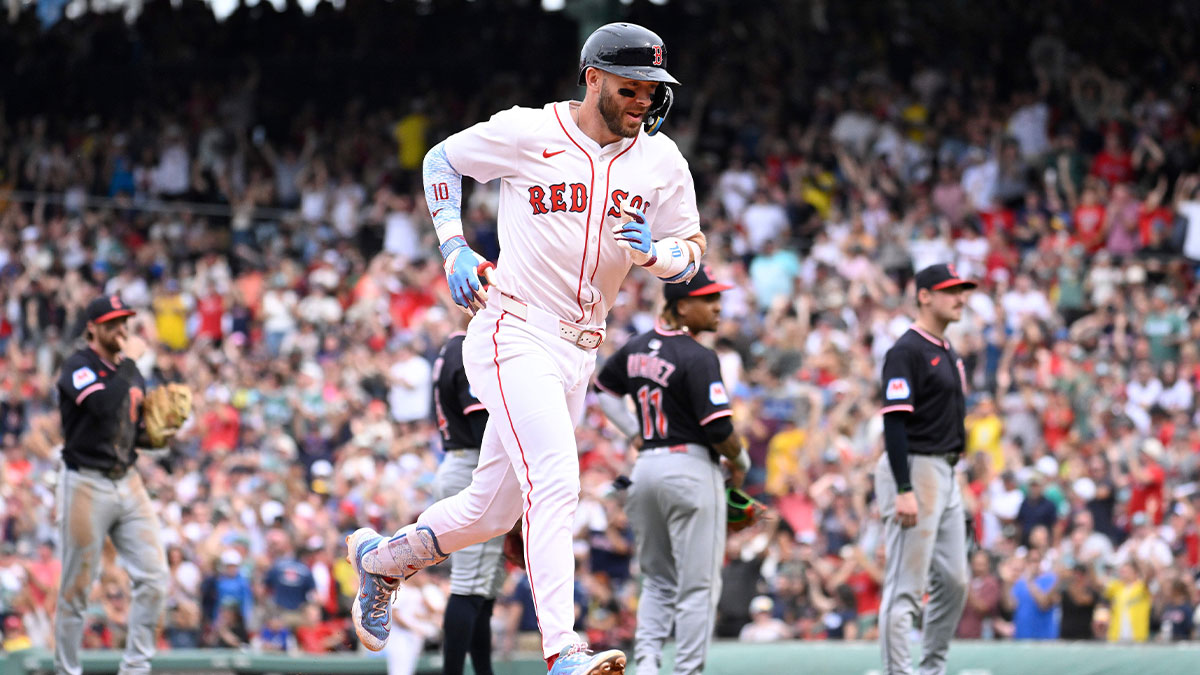 Boston Red Sox shortstop Trevor Story (10) runs the bases after being awarded a home run based on a video review during the sixth inning against the Cleveland Guardians at Fenway Park.