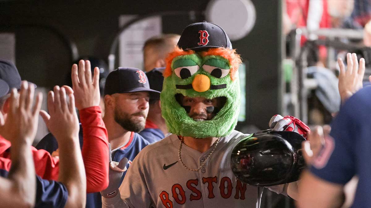 Boston Red Sox catcher Carlos Narváez (75) celebrates with team mates after hitting a home run against the Athletics during the fifth inning at Sutter Health Park.