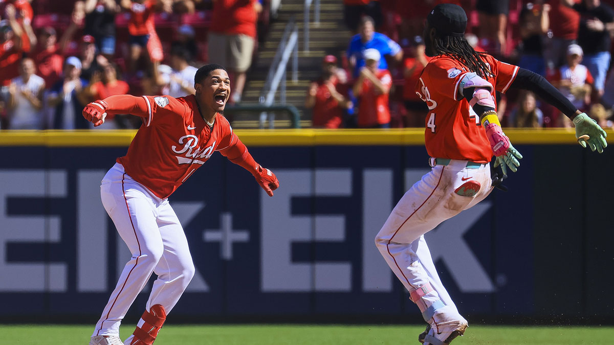Cincinnati Reds outfielder Noelvi Marte (16) celebrates with shortstop Elly De La Cruz (44) after the walk-off victory over the Toronto Blue Jays at Great American Ball Park.