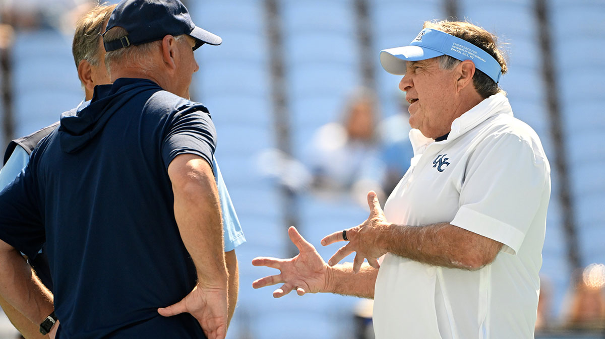 North Carolina Tar Heels head coach Bill Belichick with Richmond Spiders head coach Russ Huesman before the game at Kenan Stadium.