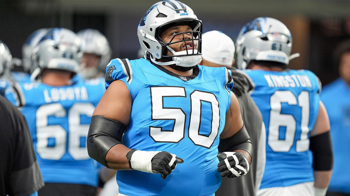 Carolina Panthers guard Robert Hunt (50) takes the field during Fanfest at Bank of America Stadium.