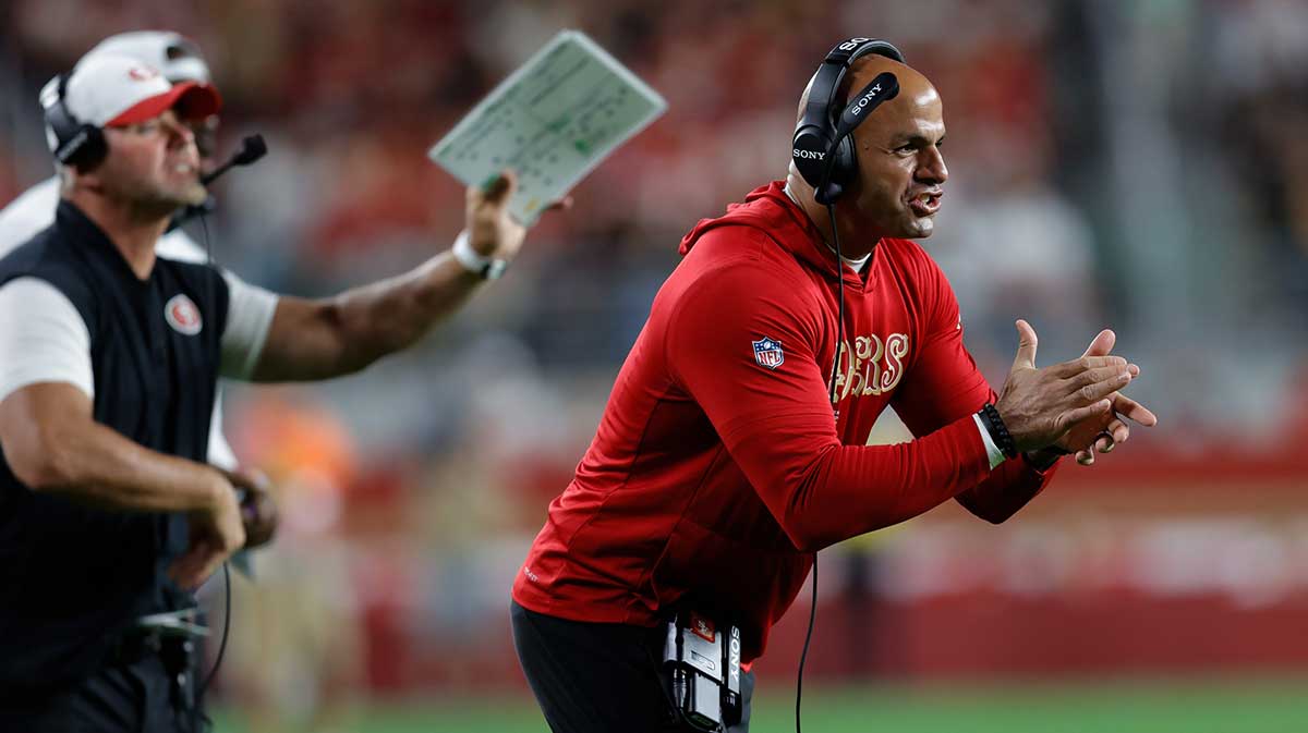 San Francisco 49ers defensive coordinator Robert Saleh celebrates after a play during the fourth quarter against the Los Angeles Chargers at Levi's Stadium. Mandatory Credit: Sergio Estrada-Imagn Images