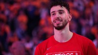 Rockets center Alperen Sengun (28) stands on the court against the Golden State Warriors before the start of game six of the first round for the 2025 NBA Playoffs at Chase Center with Kendrick Perkins in the background