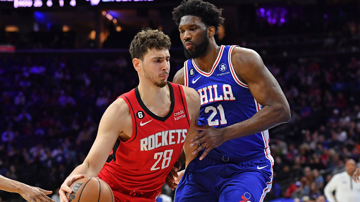 Houston Rockets center Alperen Sengun (28) drives to the basket against Philadelphia 76ers center Joel Embiid (21) at Wells Fargo Center.