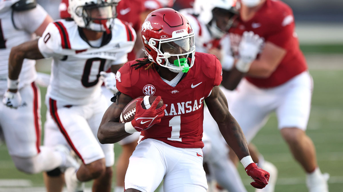 Arkansas Razorbacks running back Rodney Hill (1) rushes during the fourth quarter against the Arkansas State Red Wolves at War Memorial Stadium. Arkansas won 56-14.