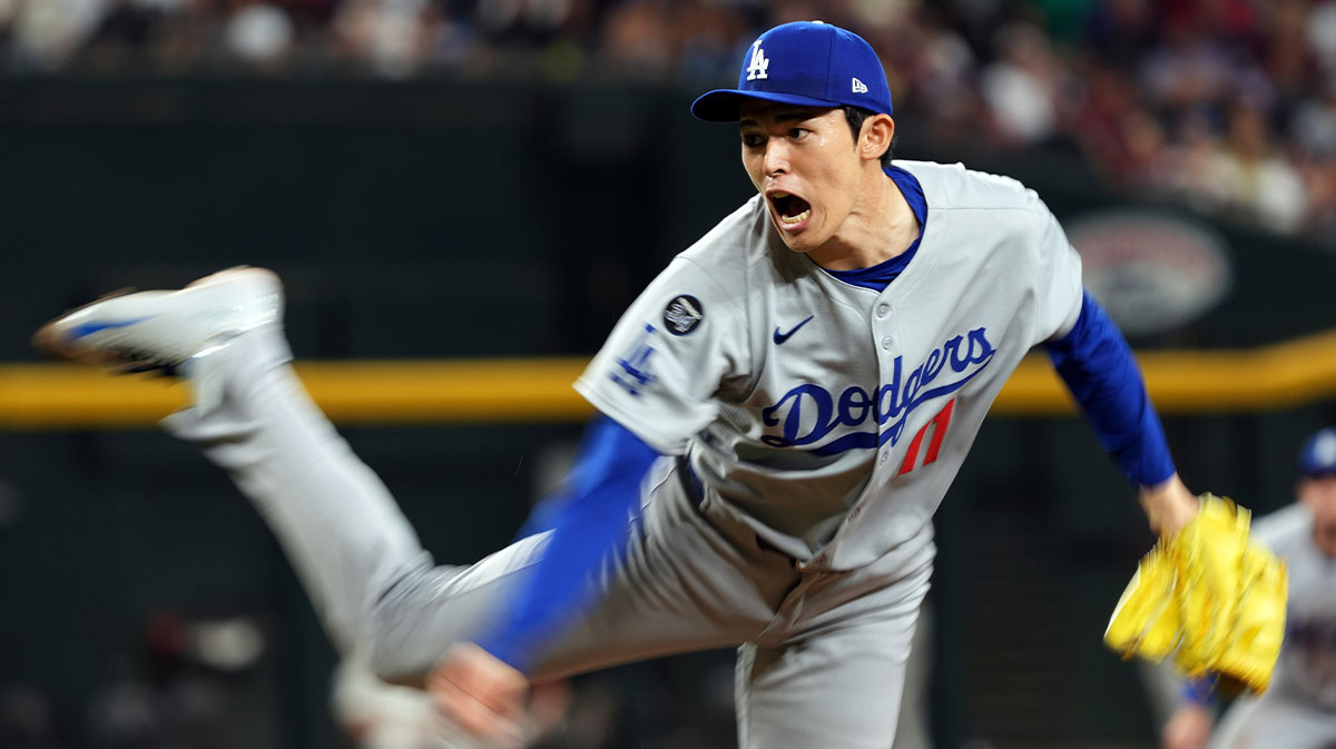 Los Angeles Dodgers pitcher Roki Sasaki throws against the Arizona Diamondbacks in the seventh inning at Chase Field.