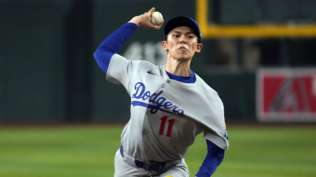 Los Angeles Dodgers pitcher Roki Sasaki throws against the Arizona Diamondbacks in the seventh inning at Chase Field.