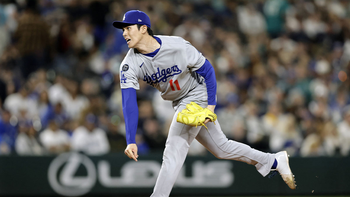 Los Angeles Dodgers pitcher Roki Sasaki (11) throws against the Seattle Mariners at T-Mobile Park.