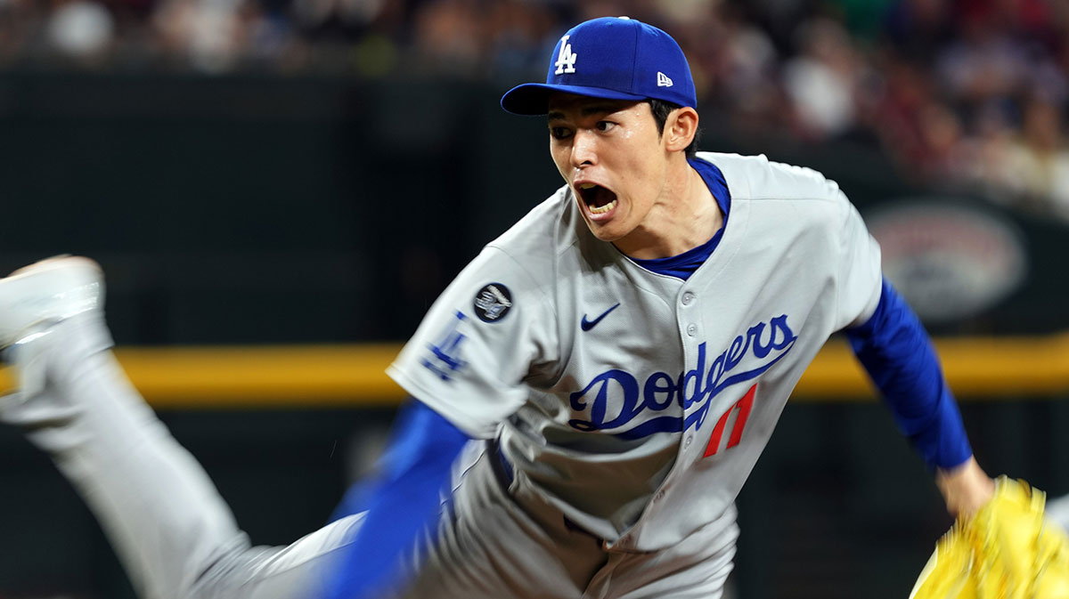 Los Angeles Dodgers pitcher Roki Sasaki throws against the Arizona Diamondbacks in the seventh inning at Chase Field.