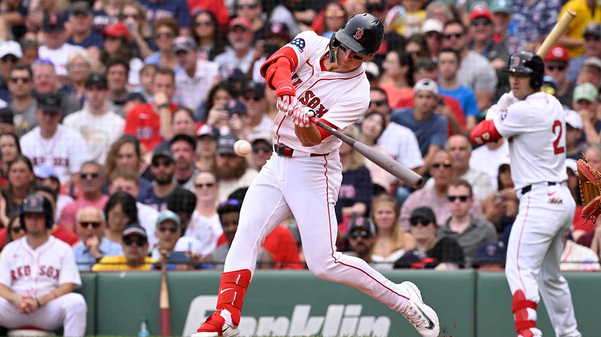 Boston Red Sox right fielder Roman Anthony (19) hits a single against the Cleveland Guardians during the second inning at Fenway Park.