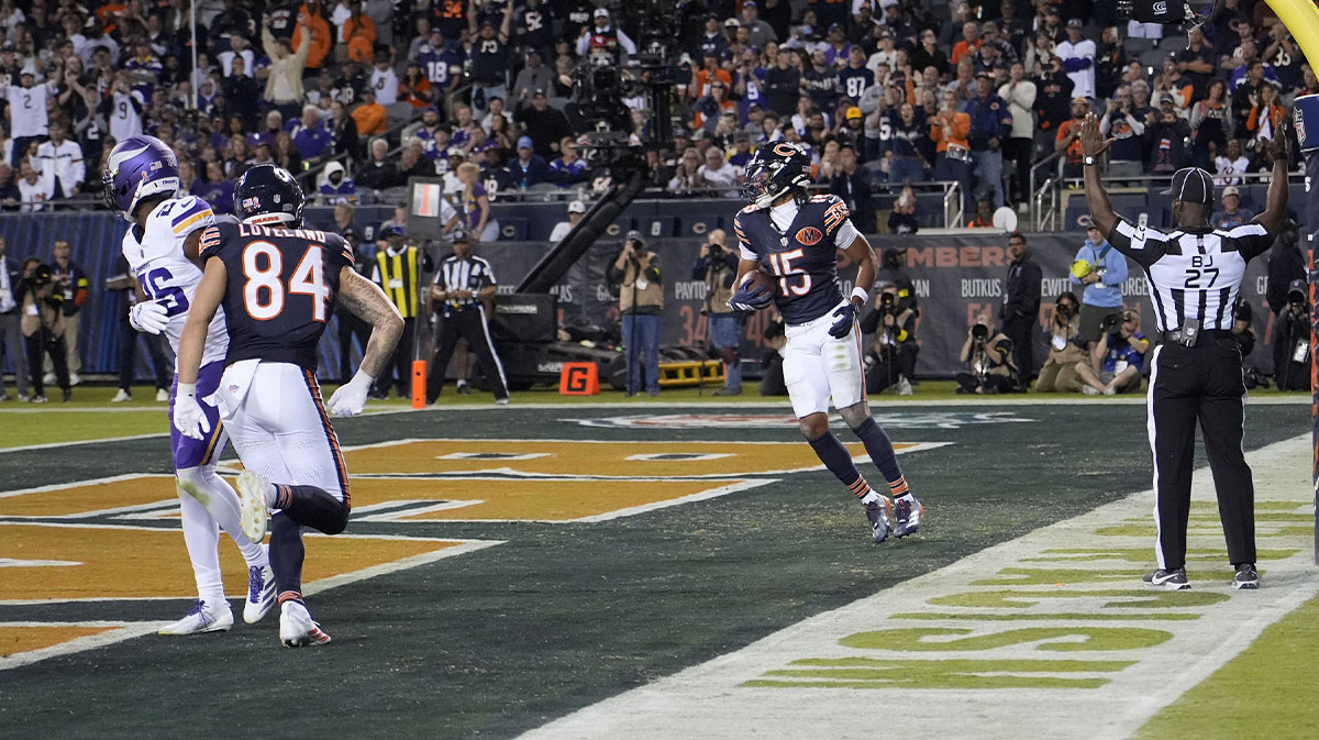 Chicago Bears wide receiver Rome Odunze (15) catches a touchdown pass against the Minnesota Vikings during the second half at Soldier Field.