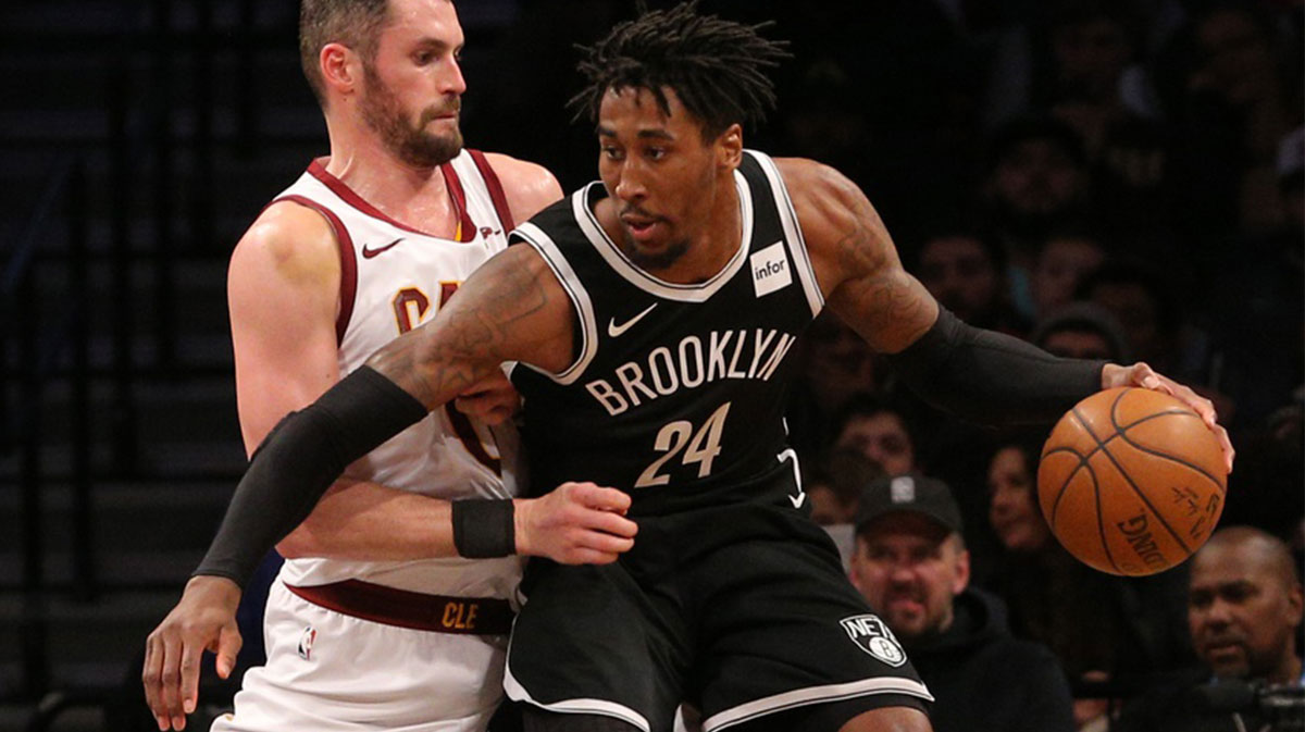 Brooklyn Nets small forward Rondae Hollis-Jefferson (24) controls the ball against Cleveland Cavaliers center Kevin Love (0) during the second quarter at Barclays Center.