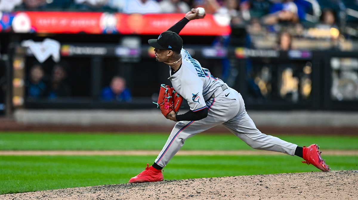 Miami Marlins pitcher Ronny Henriquez (32) pitches against the New York Mets during the eighth inning.