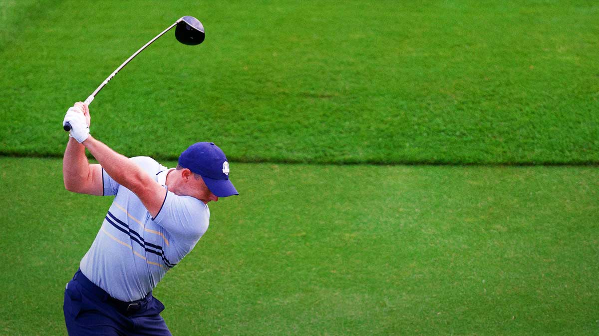 Team Europe golfer Rory McIlroy plays his shot from the first tee on the first day of competition for the Ryder Cup at Bethpage Black.