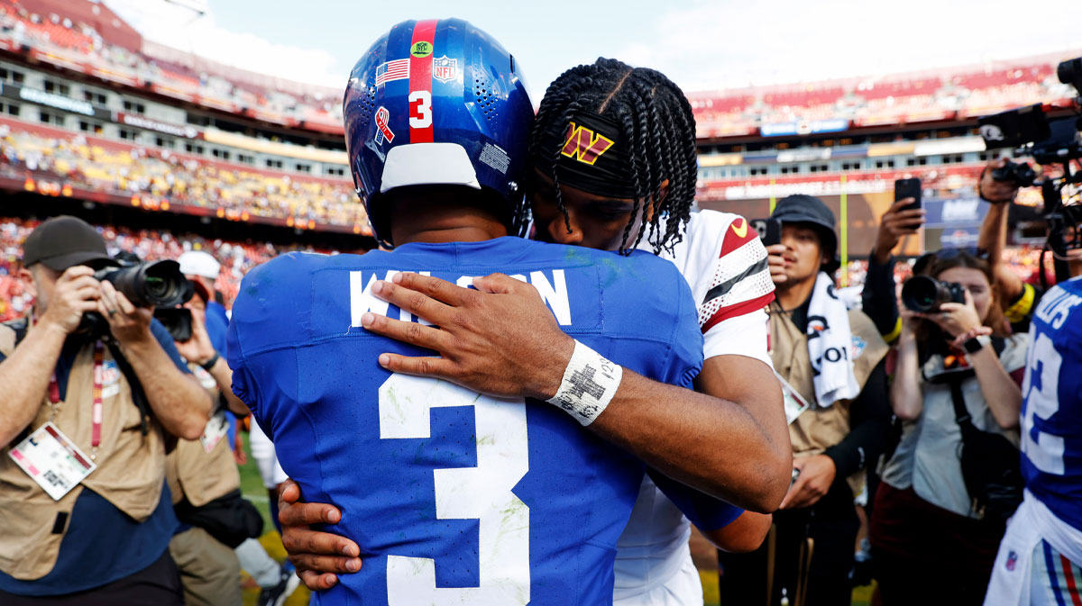 New York Giants quarterback Russell Wilson and Jayden Daniels of the Washington Commanders after their Week 1 game.