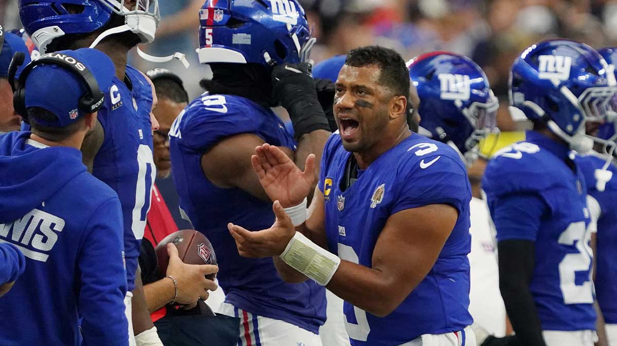 New York Giants quarterback Russell Wilson (3) claps after a play against the Dallas Cowboys during the fourth quarter at AT&T Stadium.