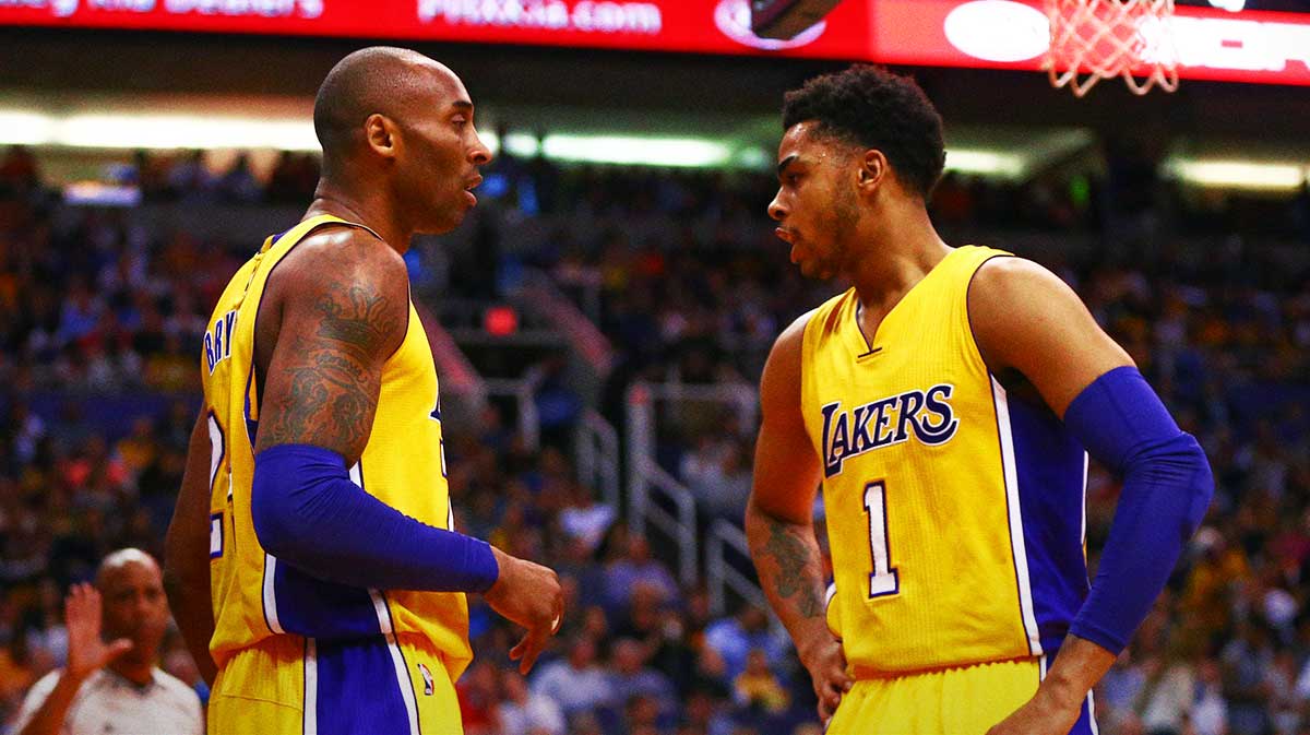 Los Angeles Lakers guard Kobe Bryant (24) and guard D'Angelo Russell (1) against the Phoenix Suns at Talking Stick Resort Arena. The Suns defeated the Lakers 119-107.
