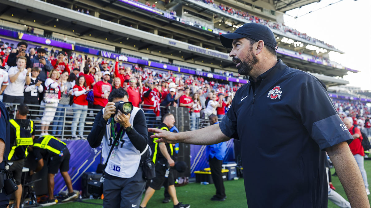 Ohio State Buckeyes head coach Ryan Day walks to the locker room following a victory against the Washington Huskies at Husky Stadium.
