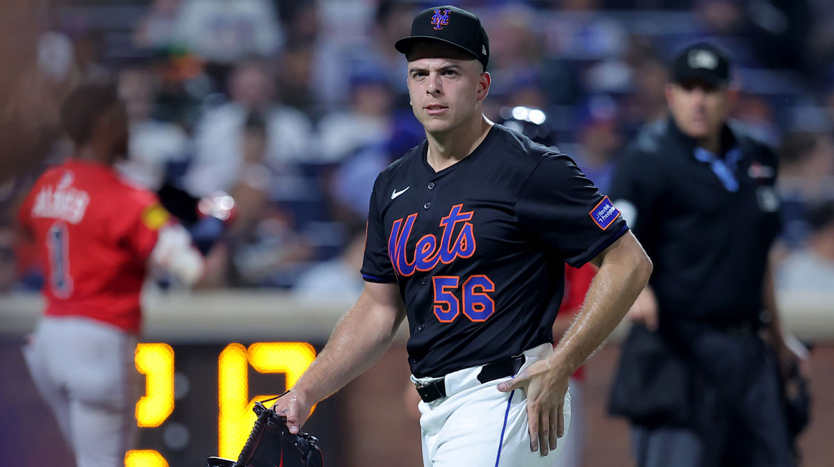 New York Mets relief pitcher Ryan Helsley (56) reacts as he walks off the field after the top of the eighth inning against the Atlanta Braves at Citi Field. 