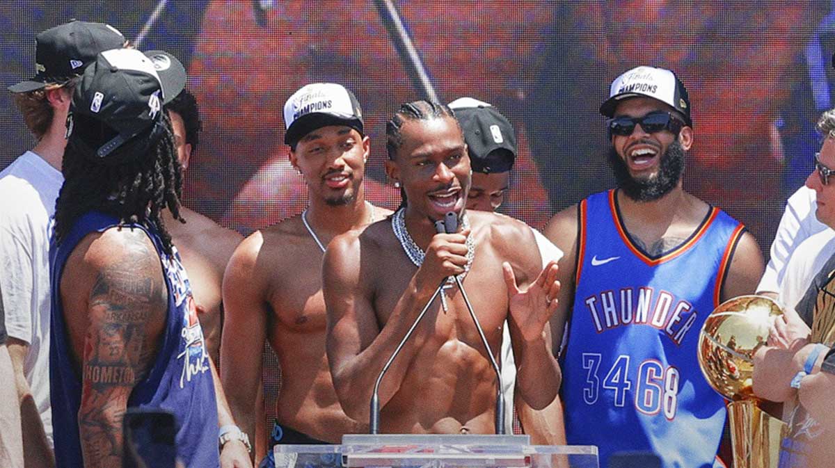 Oklahoma City Thunder guard Shai Gilgeous-Alexander speaks to fans during the Oklahoma City Thunder Champions parade.